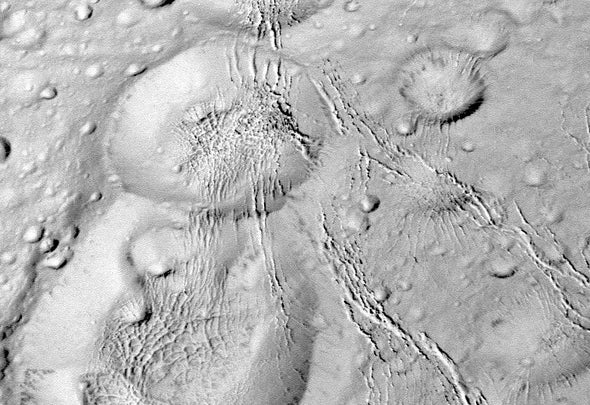 Cassini Reveals That Enceladus Is Embraced by a Web of Cracks