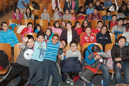 children in an auditorium