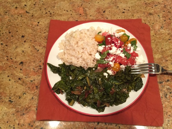 photo of plate with kale, brown rice, tomatoes and feta cheese