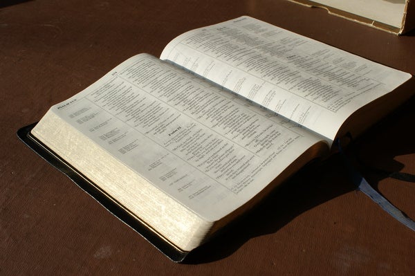 A Bible open to Psalm 22