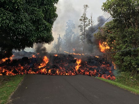 Lava piles over a street in Hawaii