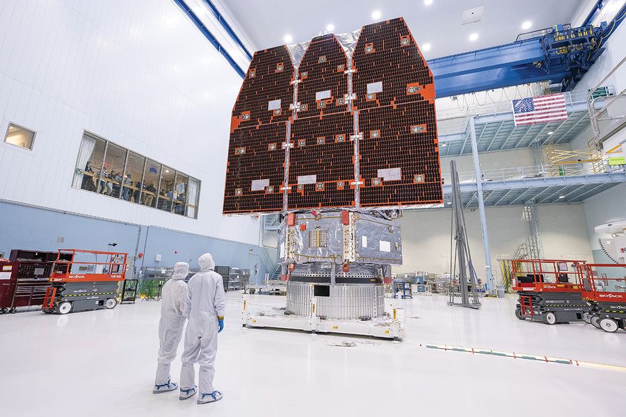 Black and orange panels are prepared in the cleanroom. Image provided by NASA/Jolearra Tshiteya.