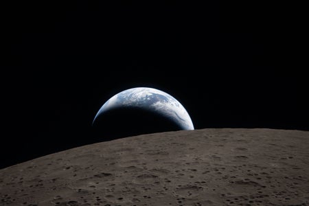 Earth sets behind the moon