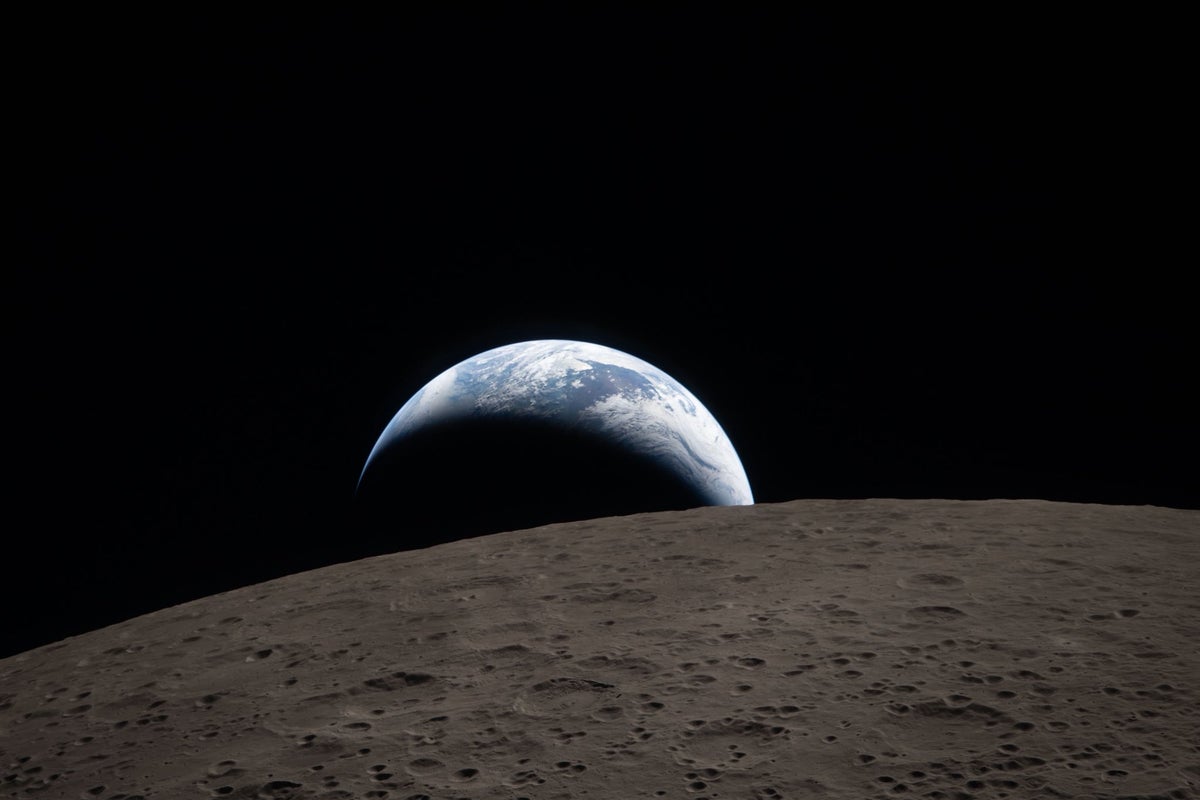 Earth sets behind the moon