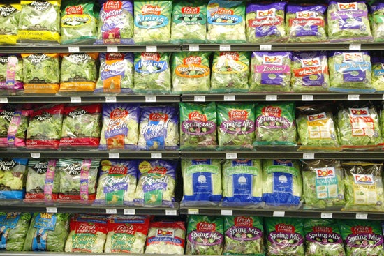 Prepackaged salad sits on the shelf at a Bell Market grocery store on June 19, 2003, in San Francisco, California.
