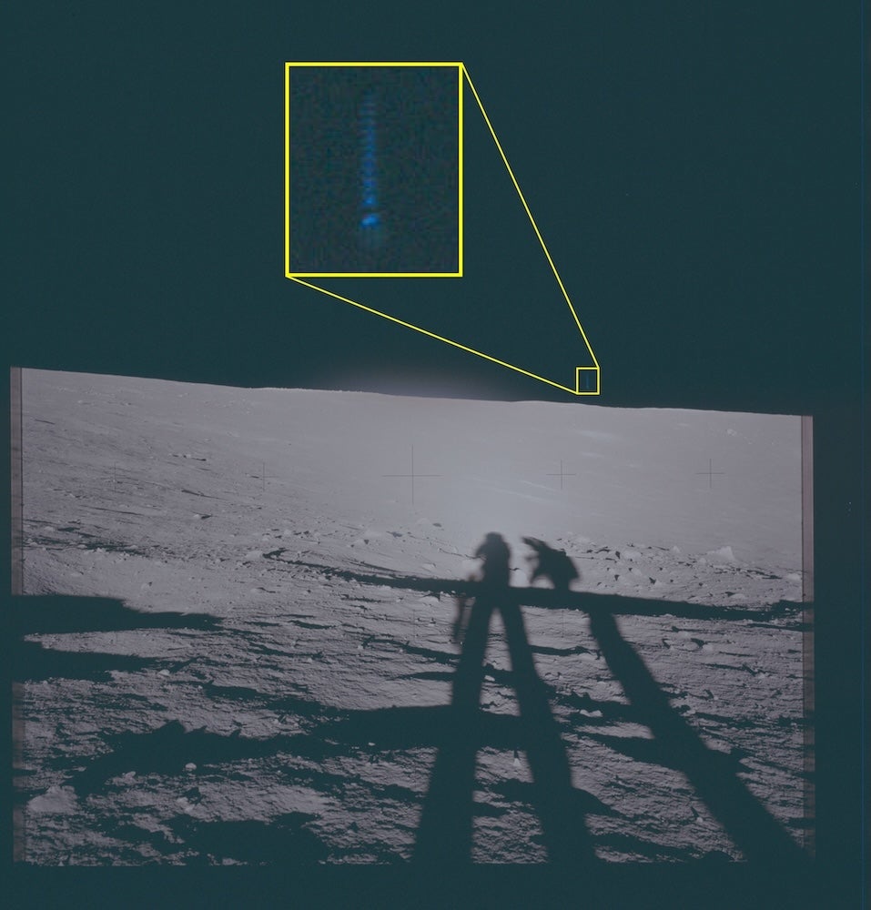 This archival photograph depicts the lunar surface as viewed from the landing site of Apollo 12. This image features a highlighted area of interest slightly to the right of the vertical axis of the frame, above the horizon, in which unidentified phenomena are visible.