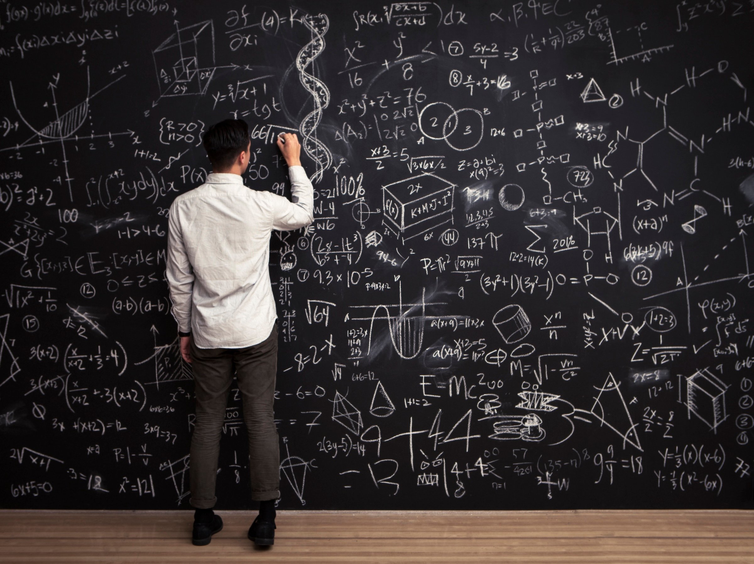 Mathematical equations on a chalkboard