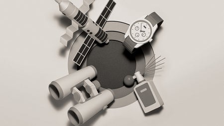 A dimensional watch, perfume bottle, binoculars and spacecraft against a grey background.