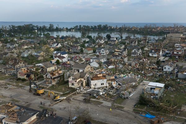 An aerial view shows damage after a tornado ripped through Menasha, Wis., on July 27, 2026. The tornado passed through several communities in the area, caused widespread power outages and left behind a long path of destruction.