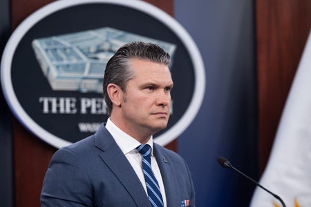 Pete Hegseth at a podium