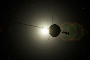 An illustration of the Voyager spacecraft leaving the solar system. The spacecraft is in silhouette with the light from the distant sun shining through.