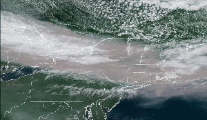 A gif of a satellite image showing a river of brown smoke over the northeastern US
