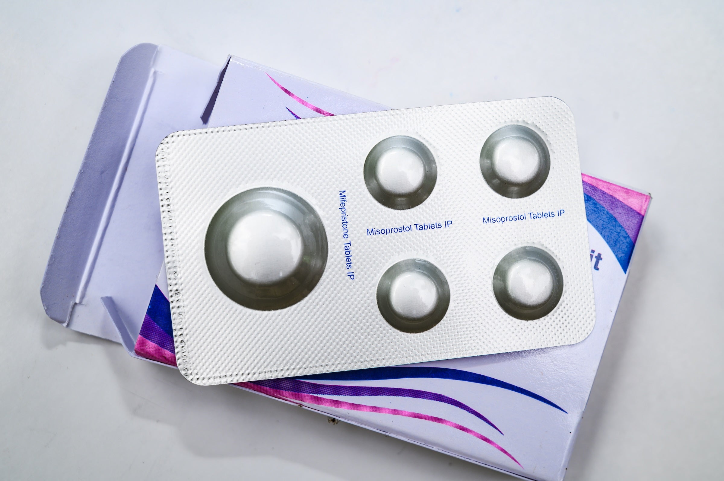 A blister pack of pills shown, with mifepristone label on package.