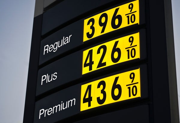 A black gas station price sign with black numbers on yellow backgrounds. The prices are $3.96 for regular, $4.26 for plus and $4.36 for premium.