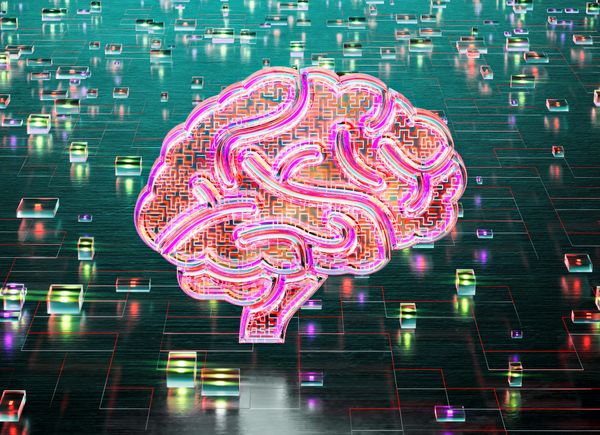 A glass colourful brain illumintaed on a background of cubes that are like switches illuminated