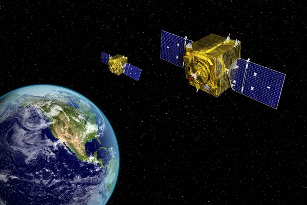 Two satellites hovering above Earth
