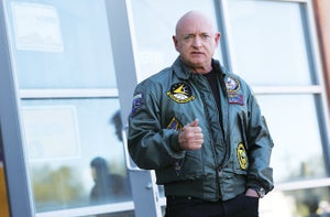 Portrait photograph of Mark Kelly provided by Kevin Dietsch/Getty Images.