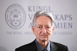 Geoffrey Hinton looking into the camera, against a Royal Swedish Academy of Sciences background.