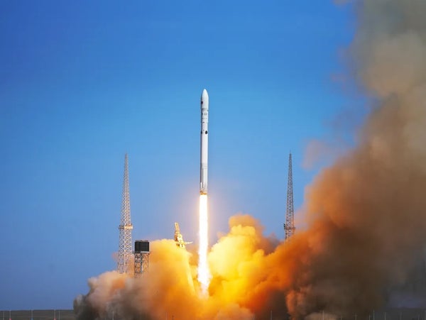 A rocket launches in a fiery blast