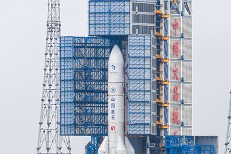 The combination of the Chang’e 7 lunar probe and the Long March-5 Y14 carrier rocket is transferred vertically to the launching area at the Wenchang Spacecraft Launch Site on August 19, 2026 in Wenchang, Hainan Province of China.