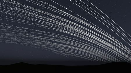 An animation showing bright rings of orbital data center satellites passing through the sky shortly after sunset.