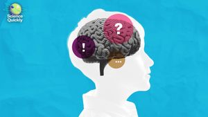 Illustration of a human brain with question mark and exclamation mark against a blue backdrop