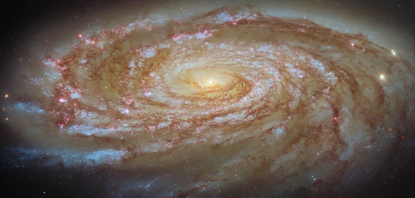 This NASA/ESA Hubble Space Telescope image features the spiral galaxy Messier 88 (M88).