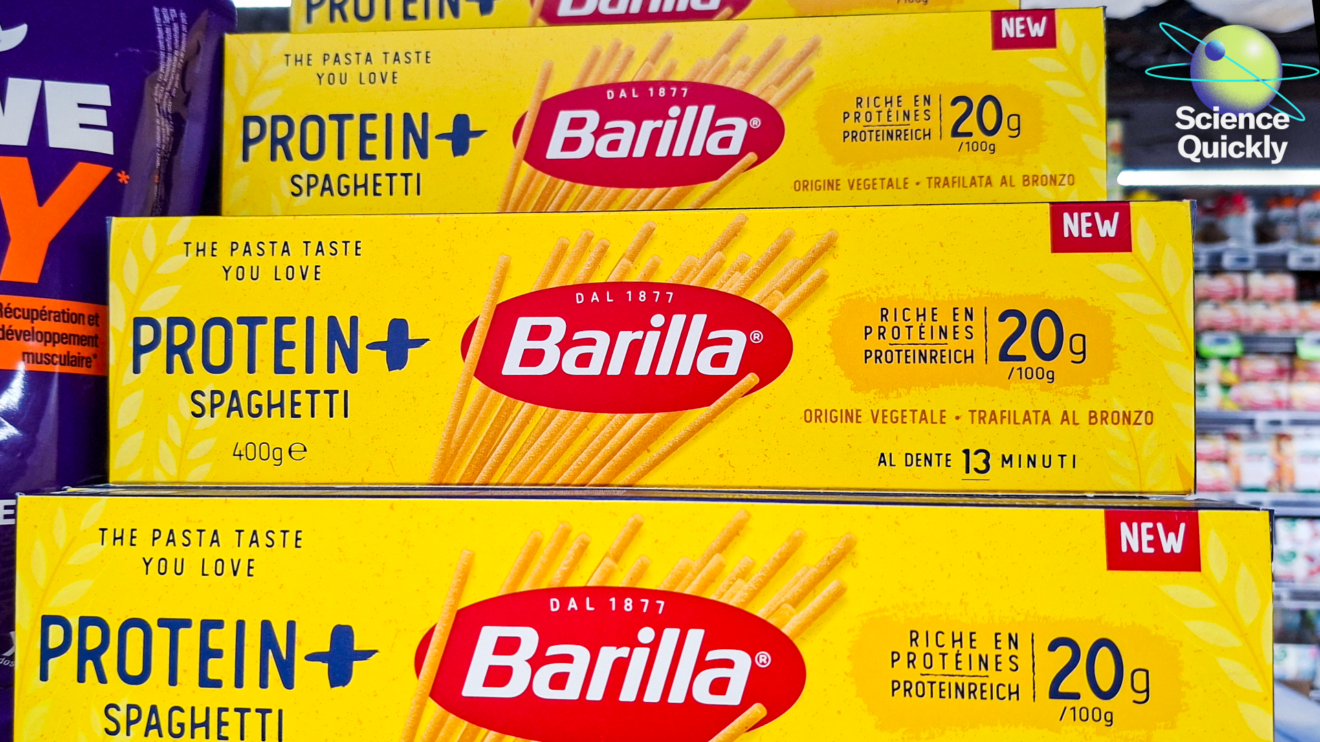 An image of boxes of Barilla Protein Plus pasta displayed on a shelf in a supermarket, highlighting a high protein content