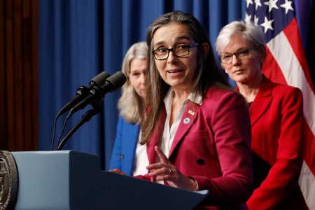 Lawrence Livermore National Laboratories director Kim Budil (center) speaks during a news conference.