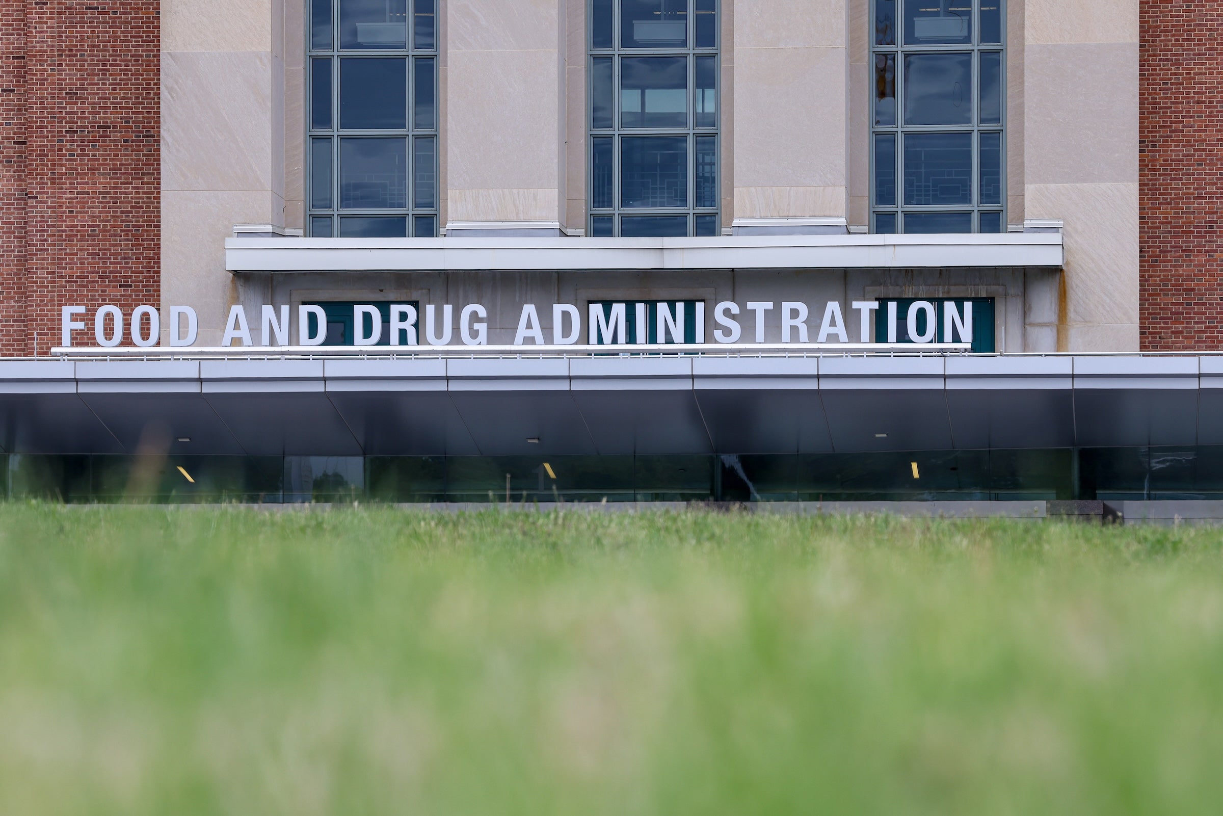 The U.S. Food and Drug Administration headquarters shown with grass in the foreground in Silver Spring, Maryland, on April 28, 2026.