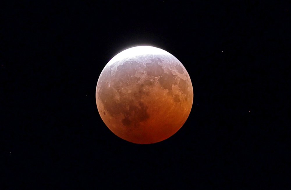 A mostly red moon.