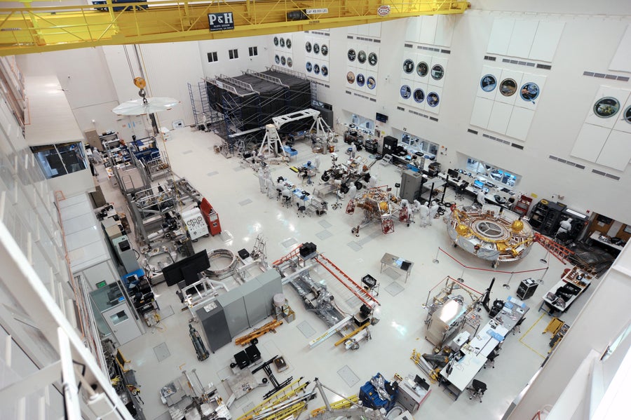 An overhead view of a spacecraft assembly cleanroom at NASA's Jet Propulsion Laboratory.