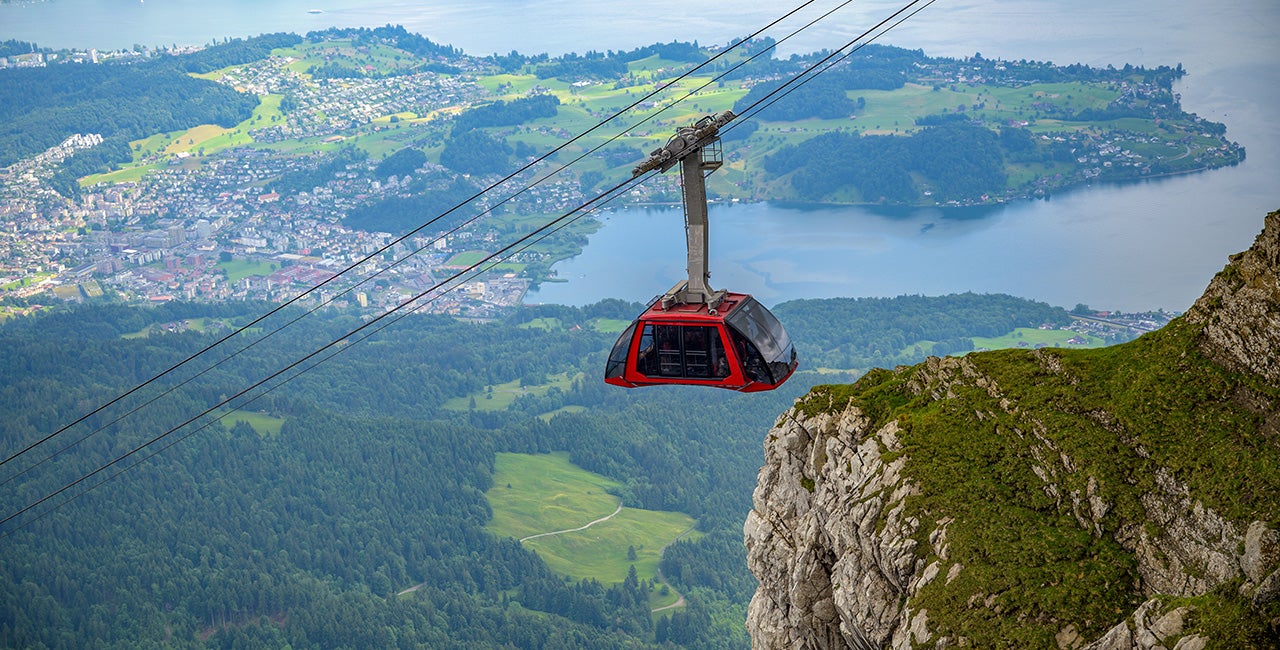 Cable car ascends Mount Pilatus Summit in Switzerland