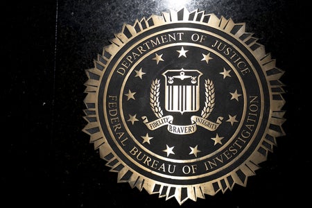 FBI logo against a dark background.