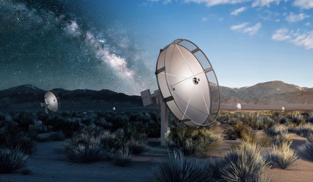 Mock-up of dish-shaped antennae scattered across the desert, with the sky fading from day to night, showing the Milky Way.