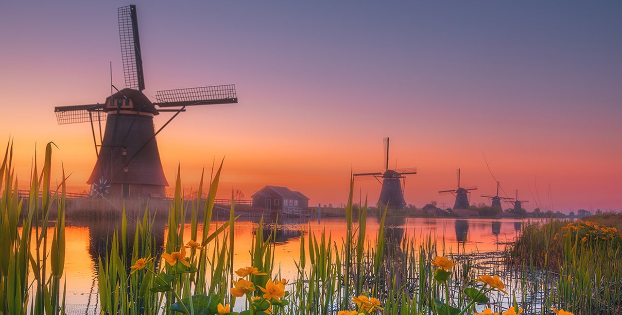 Traditional Dutch windmills in Kinderdjik at sunset