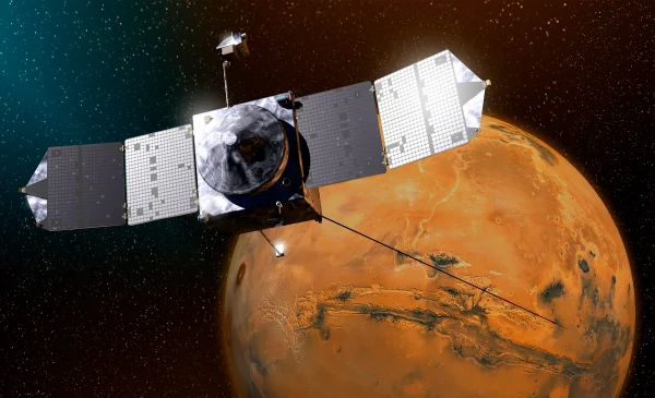 An illustration of NASA's MAVEN spacecraft at Mars.