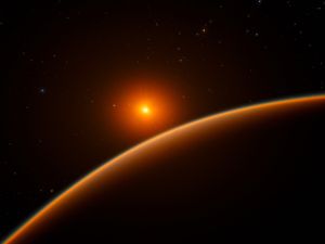 The limb of a shadowy planet is bathed in ruddy light from a glowing orange-red star in the background.