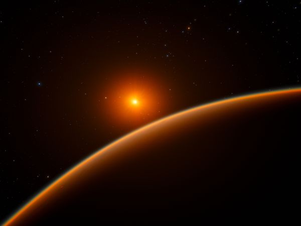 The limb of a shadowy planet is bathed in ruddy light from a glowing orange-red star in the background.