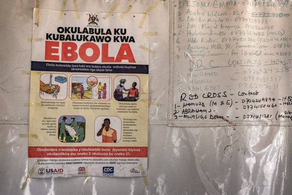 Poster with the text "Ebola" in red alongside several phone numbers