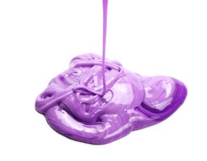 A blob of purple sludge against a white background, with more drizzling on top.
