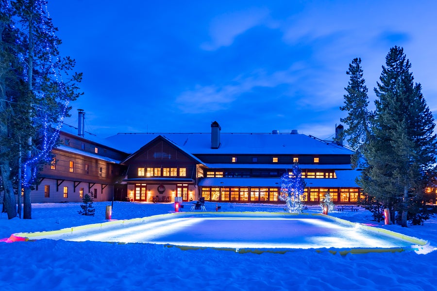 Old Faithful Snow Lodge in Yellowstone National Park lit up at night