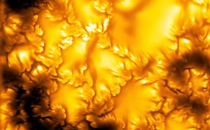A fiery view of the sun’s surface up close.