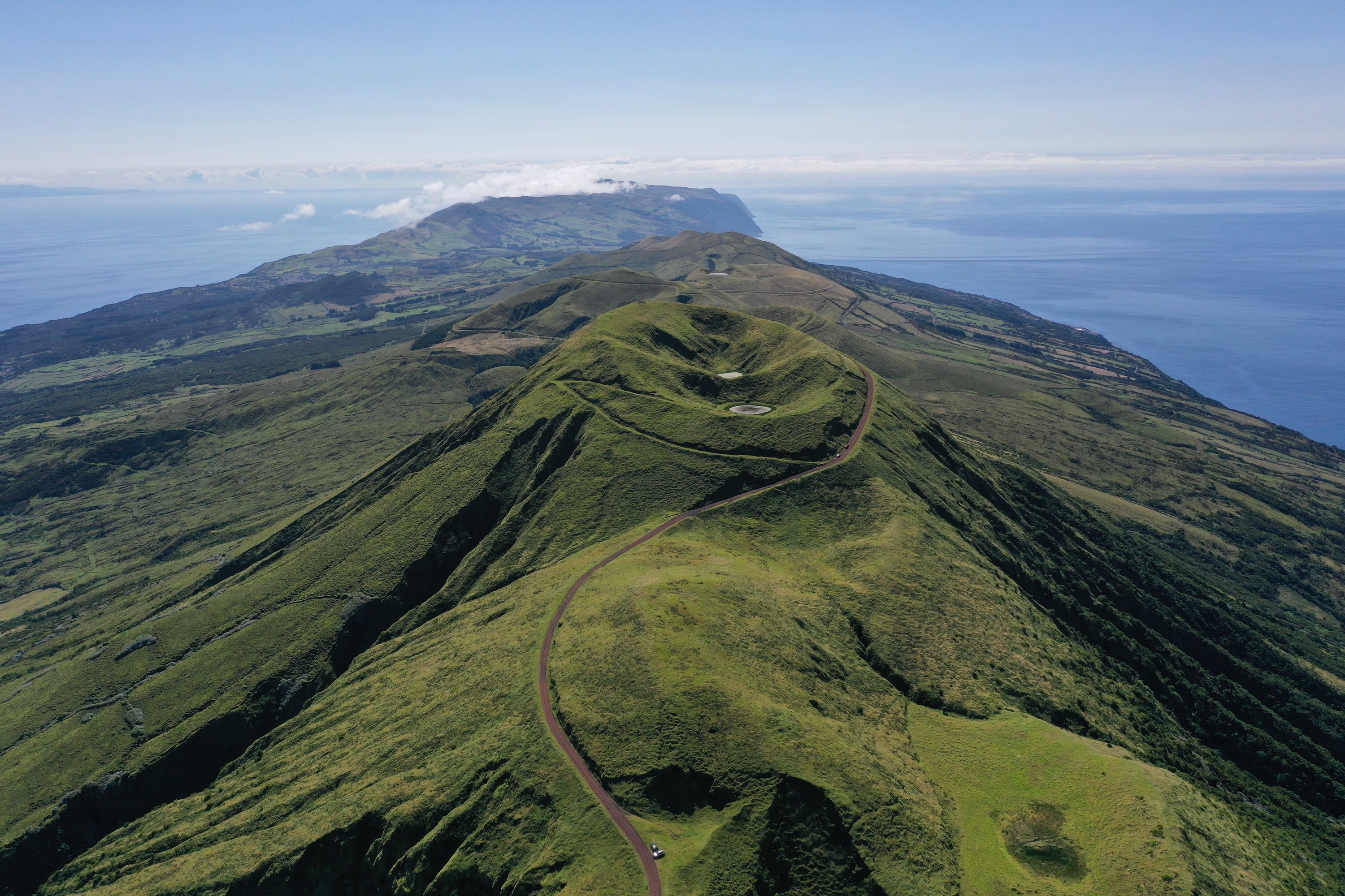 A hilly green landscape stretching into the distance