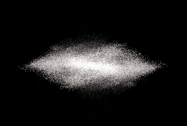 A scattering of array sweetener against a achromatic background