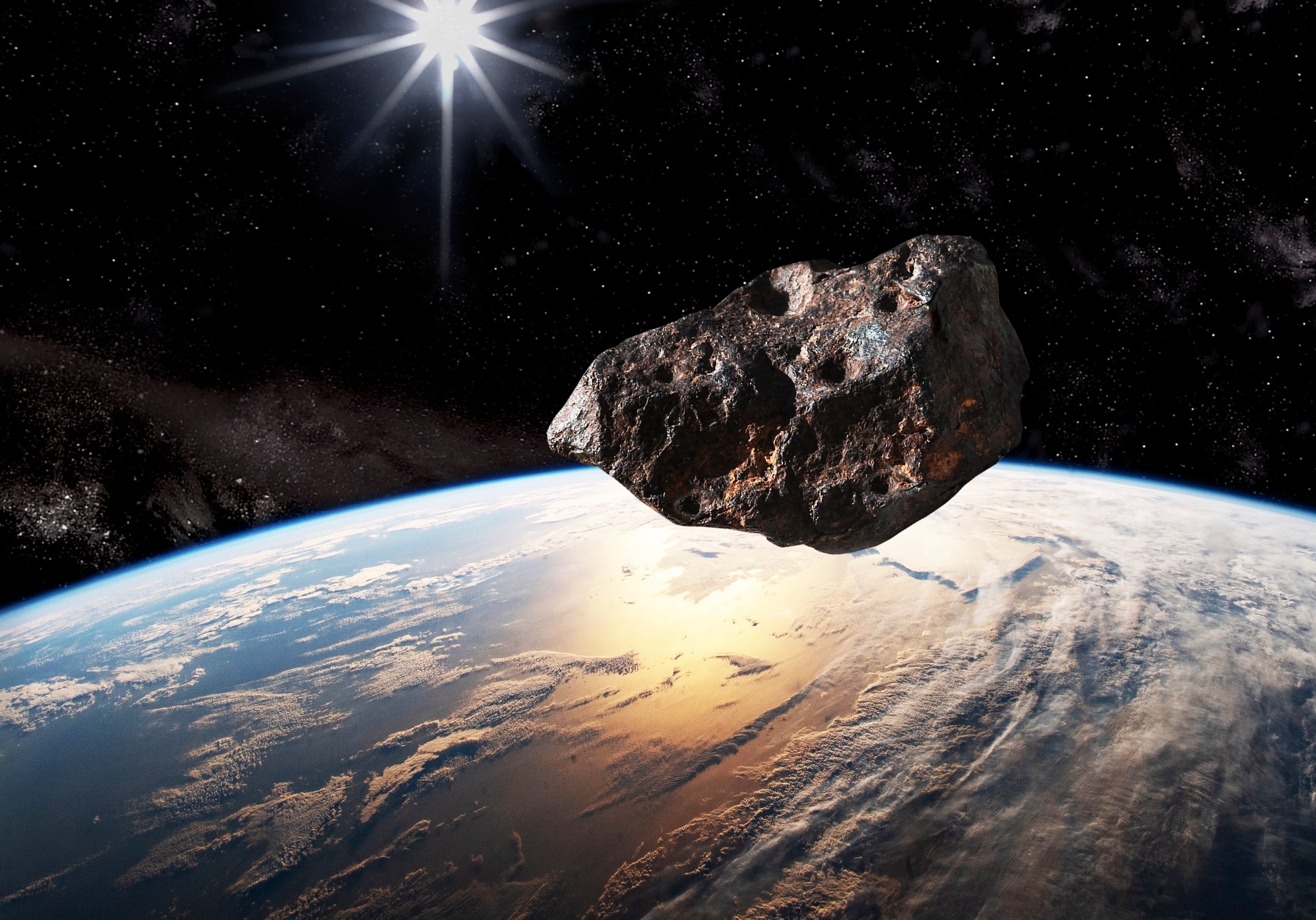 Artist's rendition of an asteroid passing near Earth
