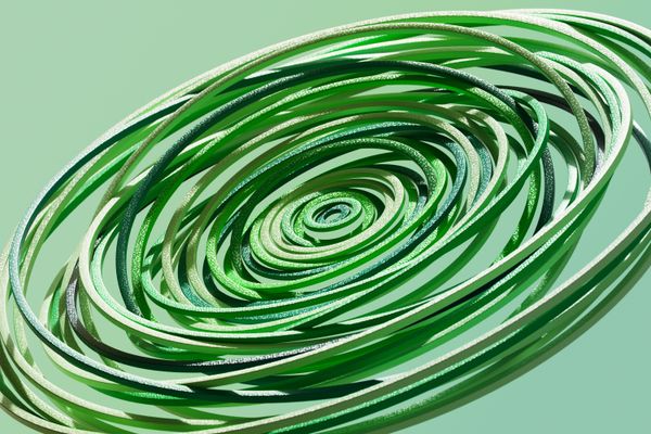 A series of green overlapping elliptical rings