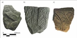 Three small sculpture fragments