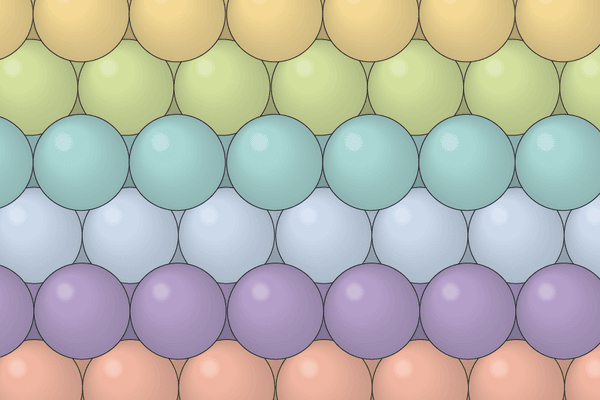 Graphic shows colored spheres packed together in a three-dimensional grid.