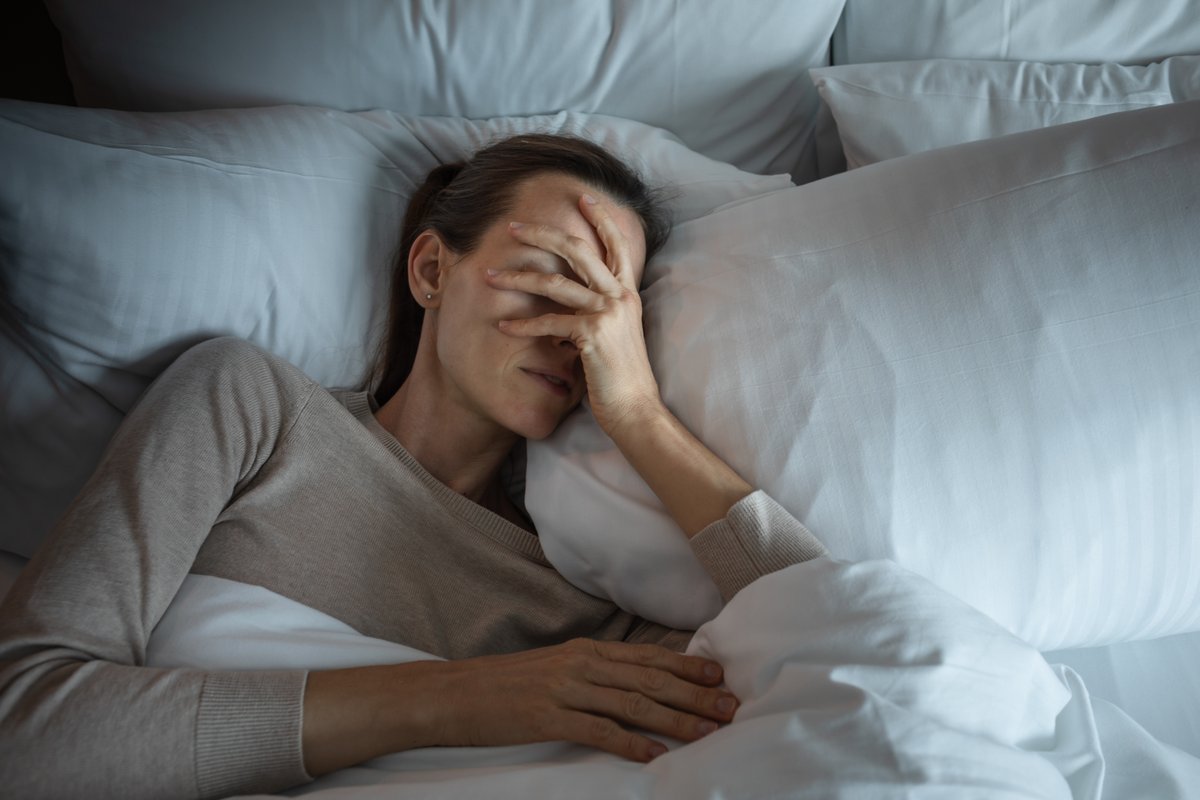 Woman in bed trying to sleep.jpg?m=1793049187